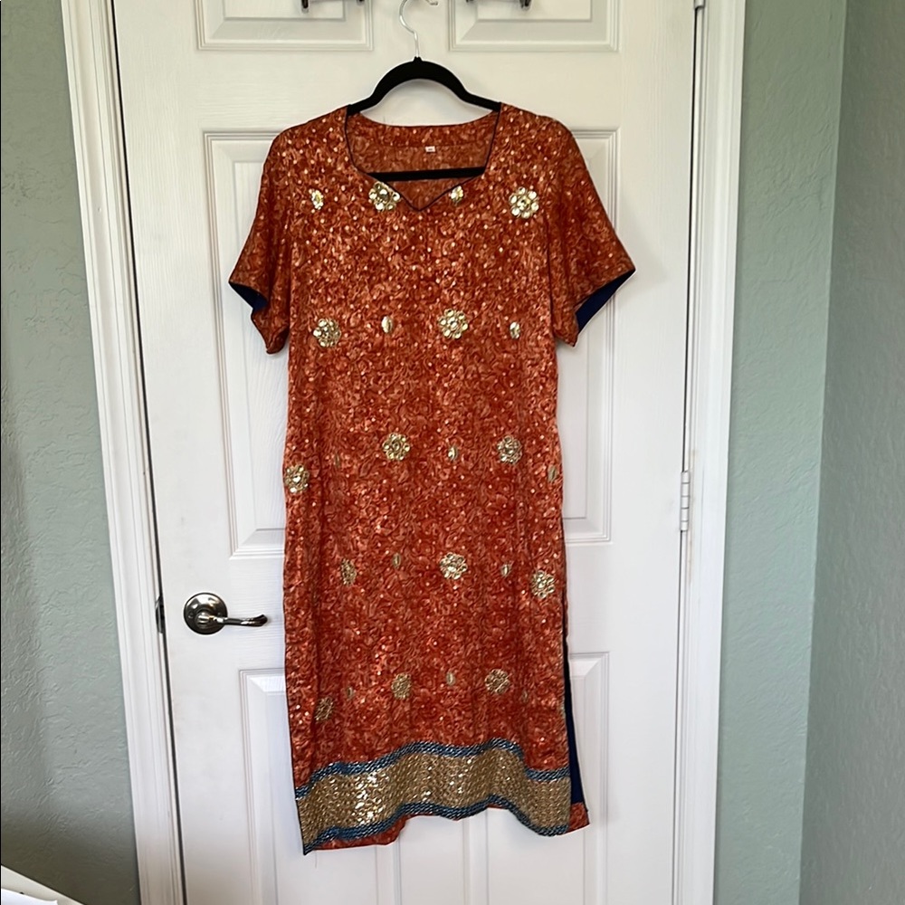 Elegant Orange Dress with Gold Accents